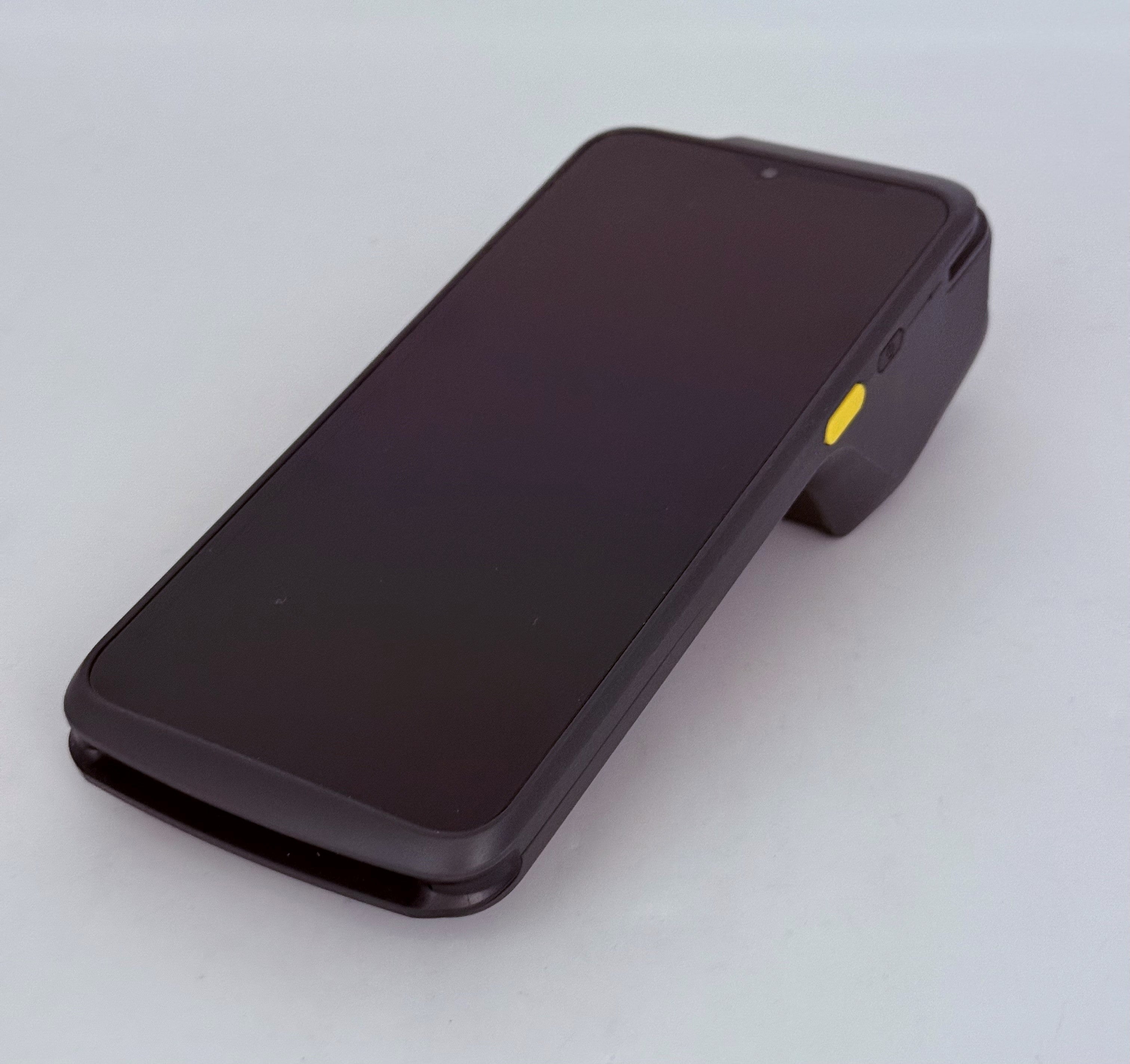 A modern setup of various POS equipment including credit card terminals, PIN pads, barcode scanners, and cash drawers arranged in a sleek, professional manner.